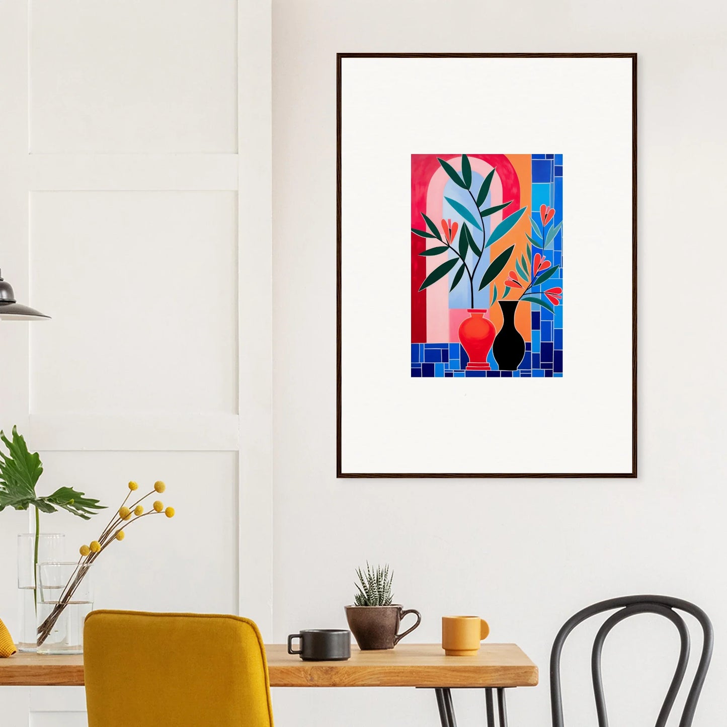 Framed wall art of colorful geometric shapes and ceramic blooms for modern room decor