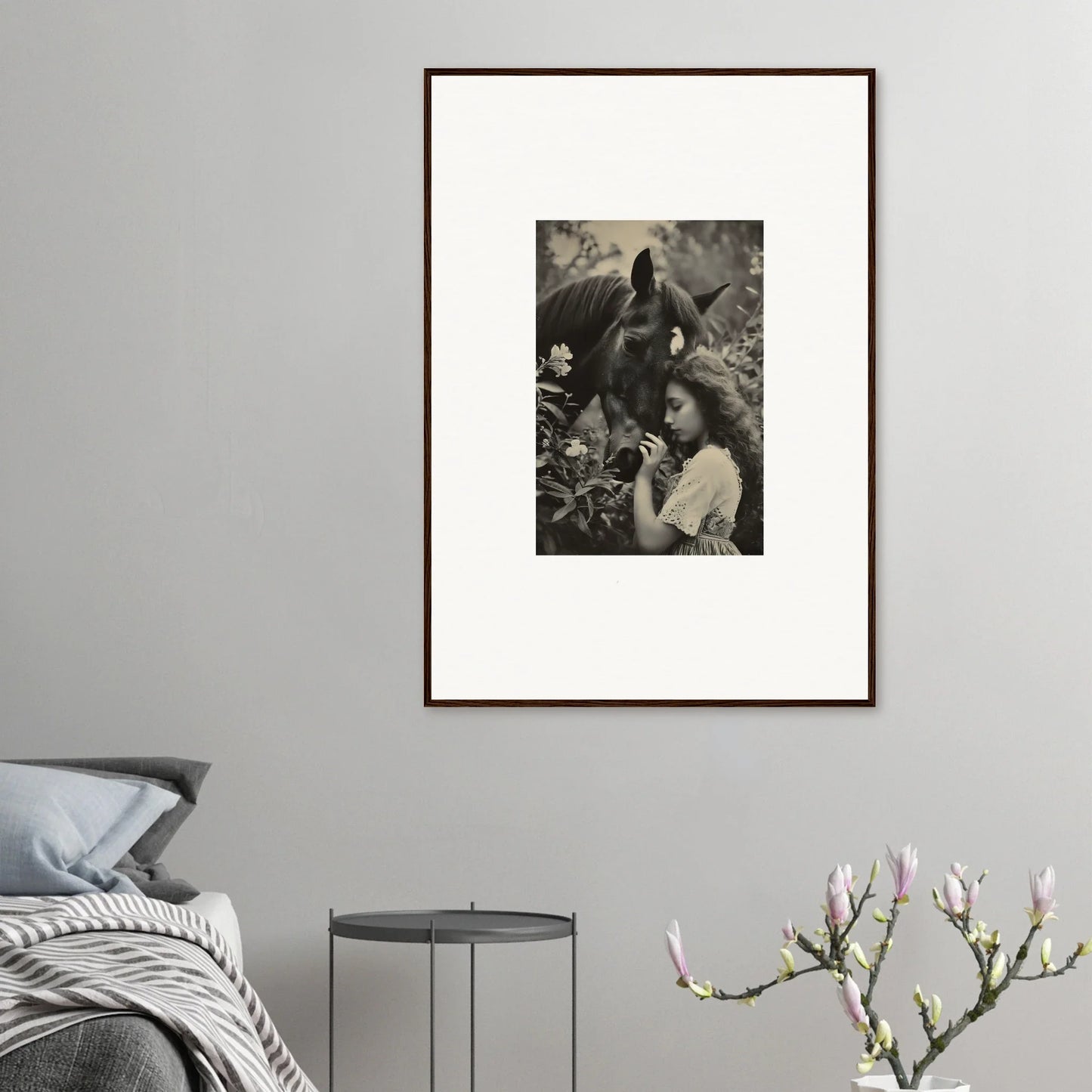 Framed black and white photo of a person with a gorilla, perfect for Equinox Whispers room decoration