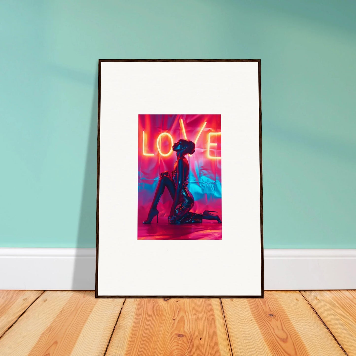 Framed canvas print of vibrant wall art with LOVE and a silhouetted figure for room decoration