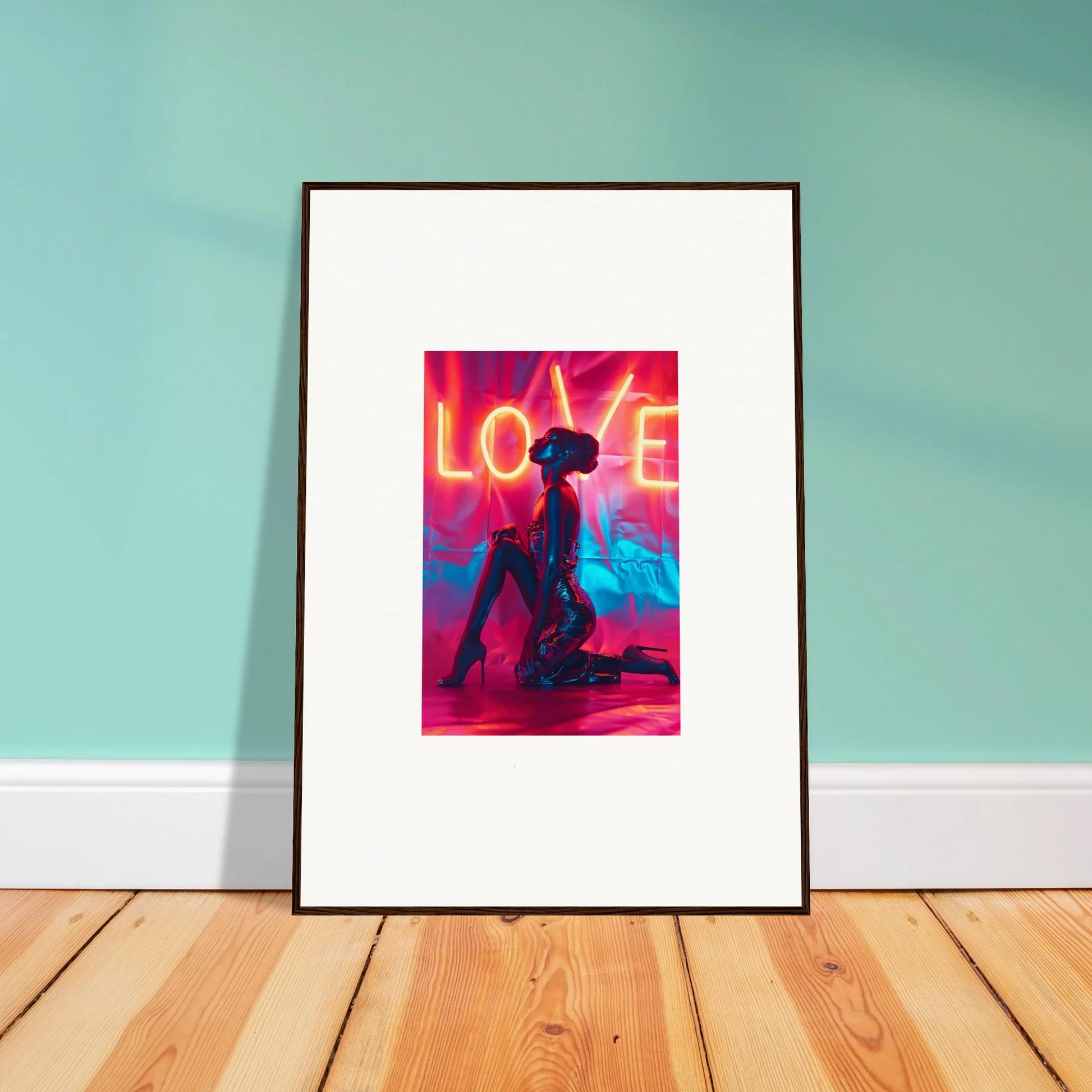 Framed canvas print of vibrant wall art with LOVE and a silhouetted figure for room decoration