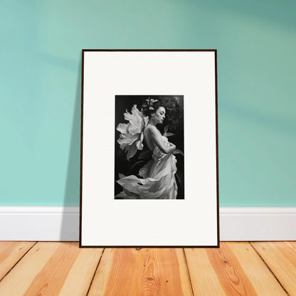 Framed black and white canvas print of a person in flowing fabric for room decoration