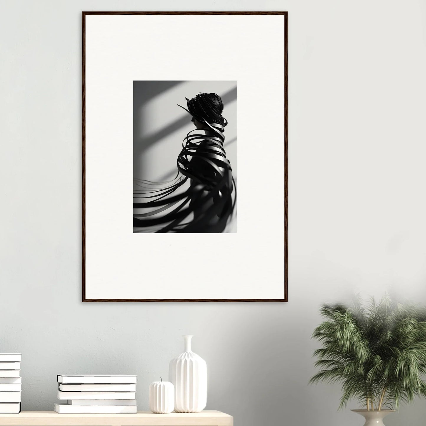 Dramatic black and white canvas print of a person with flowing fabric for room decoration