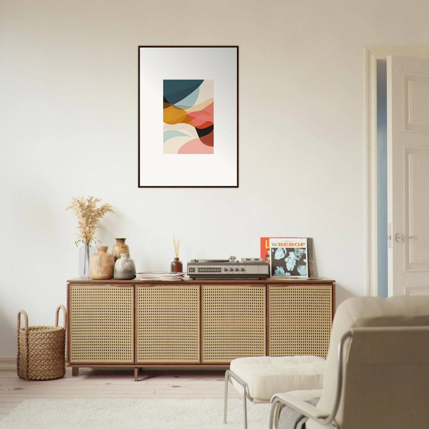 Stylish wooden sideboard with cane-webbed doors, perfect for room decoration and wall art