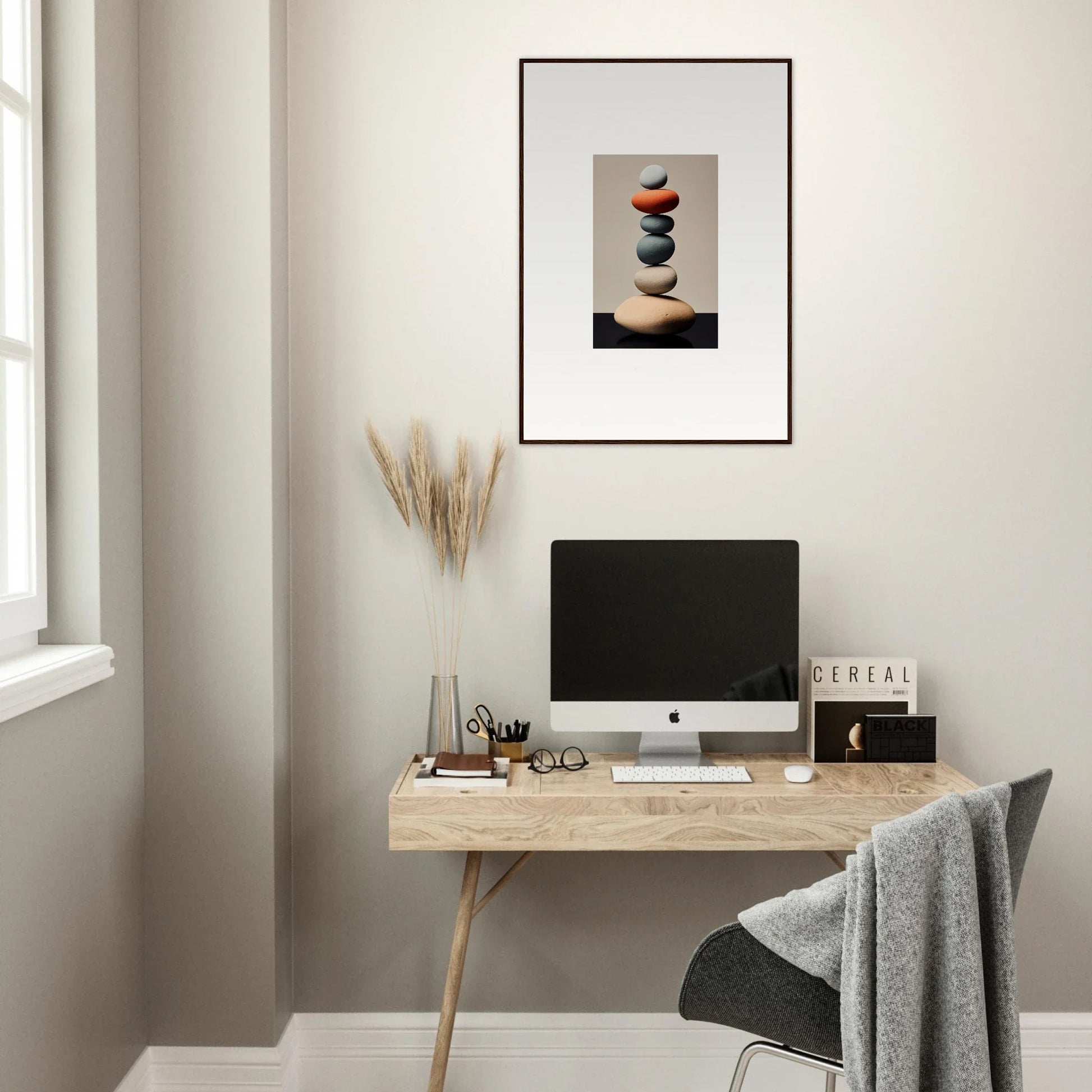 Minimalist workspace featuring wooden desk, computer, and Moroccan Dreams Remember canvas print