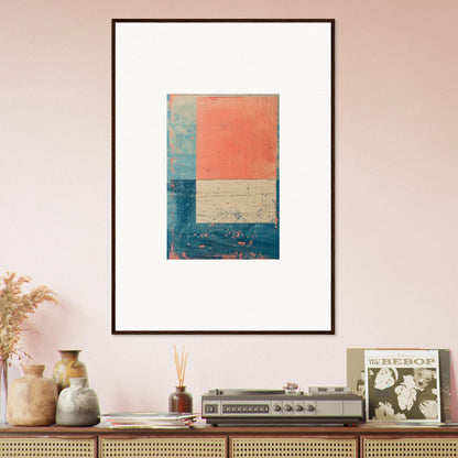 Framed abstract canvas print with coral, blue, and beige blocks for stylish room decoration