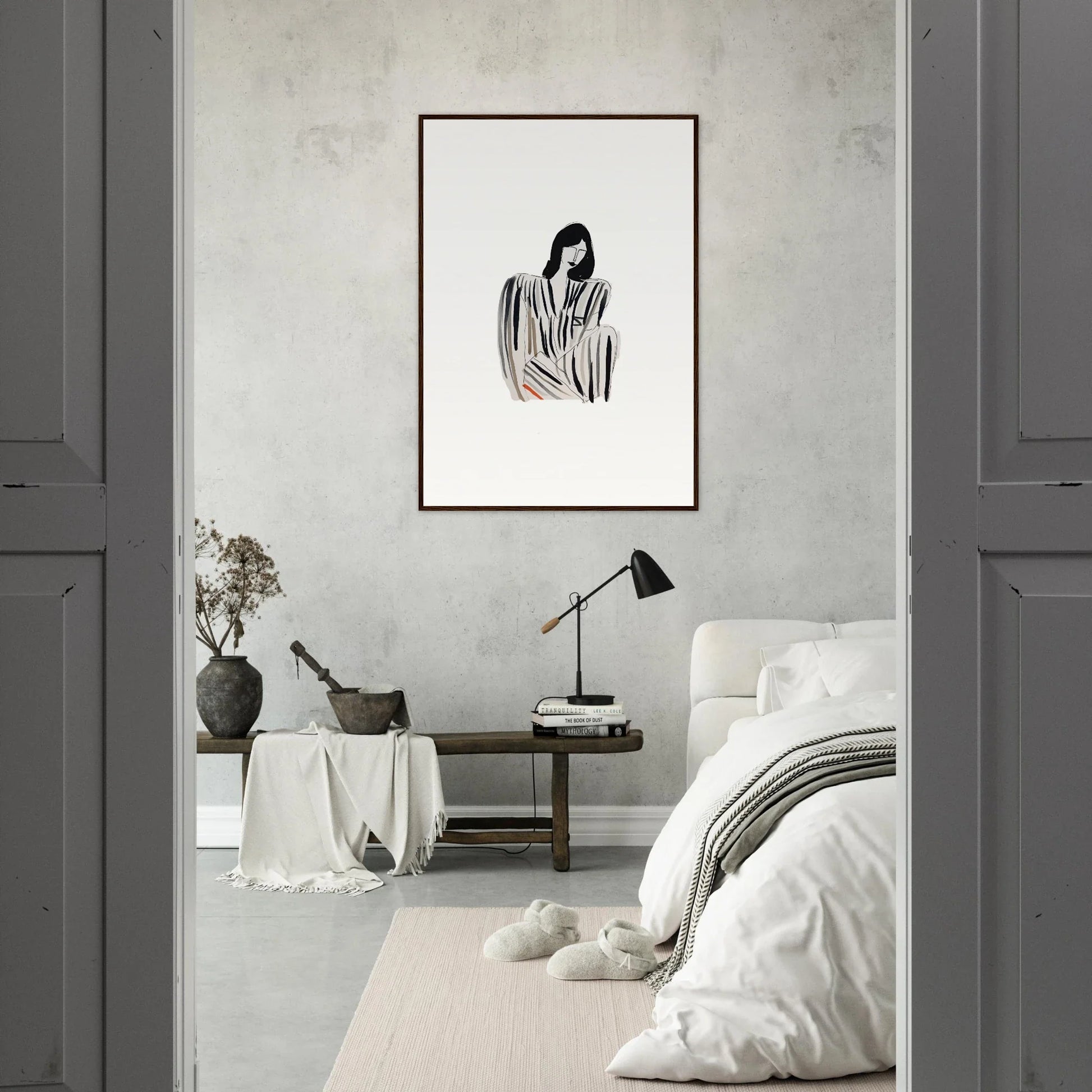 Minimalist bedroom featuring a canvas print of draped figure for stylish room decoration