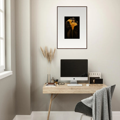 Minimalist home office with wooden desk, computer, and Bloom Couple canvas print