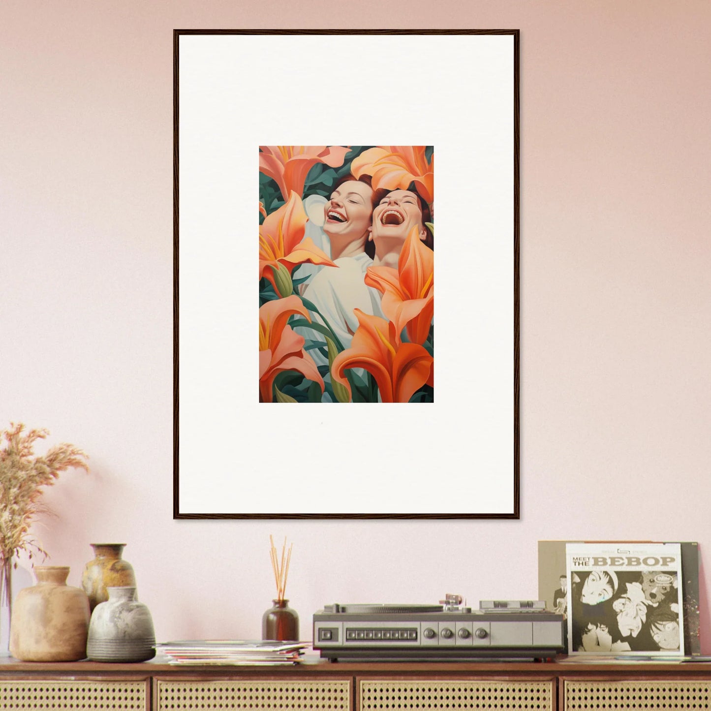 Framed wall art of two people with orange flowers for stylish room decoration