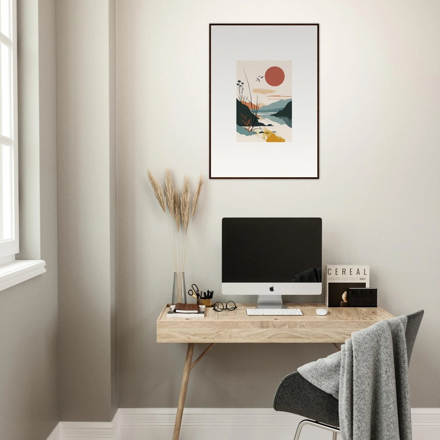 Minimalist workspace with a wooden desk, computer, and sunrise unfurled canvas print