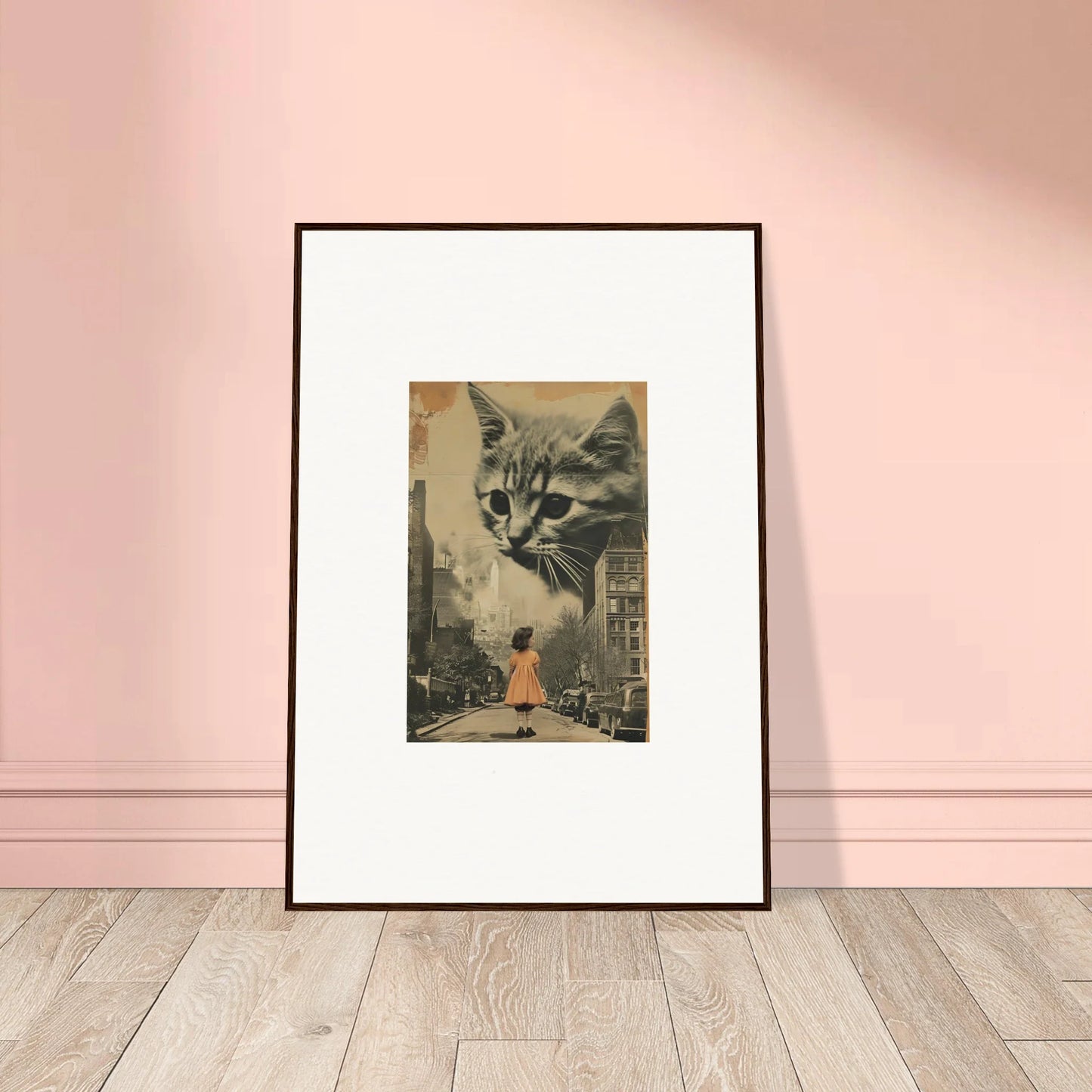 Framed wall art of a giant cat over a city street, perfect for unique room decoration