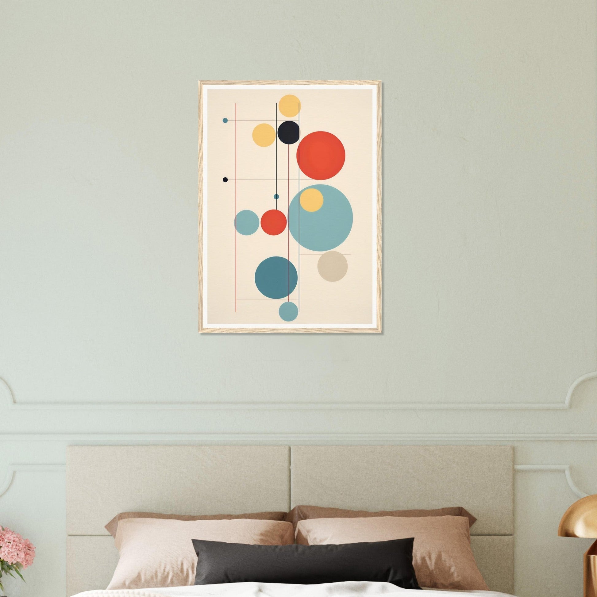 Abstract geometric artwork featuring colorful circles and lines on a light background.