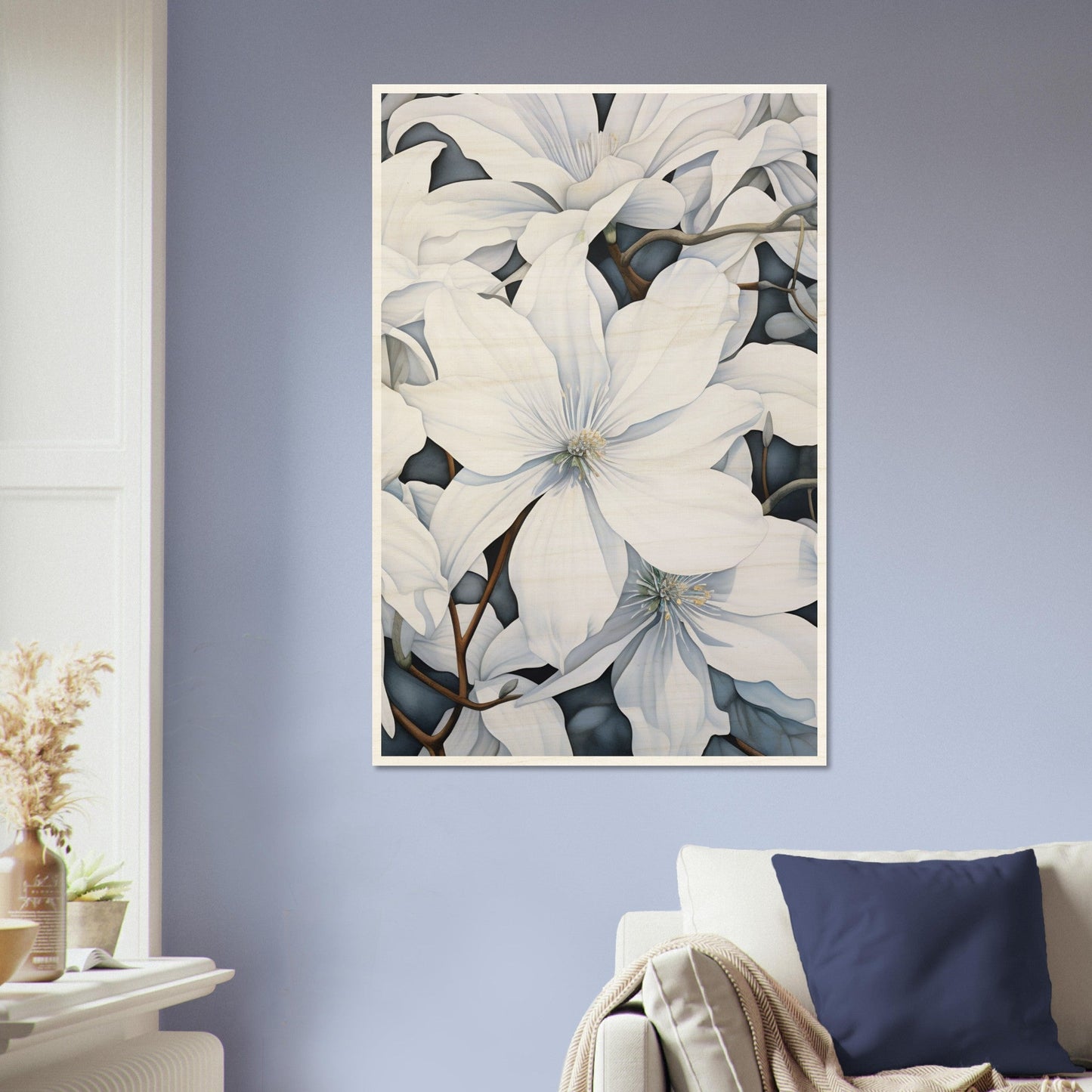 A white flower on a blue wall