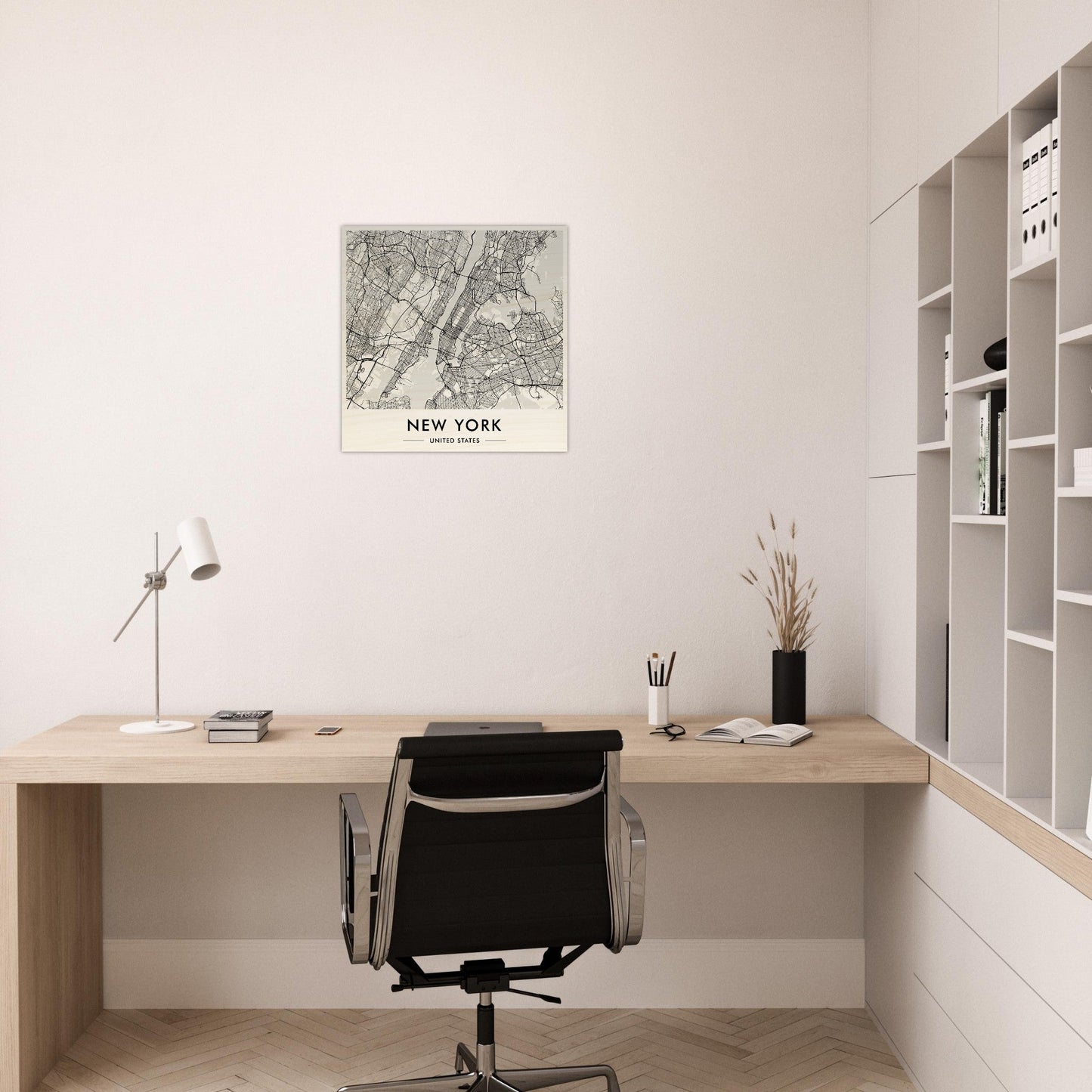 Minimalist wooden desk with a black office chair in a clean, white workspace.